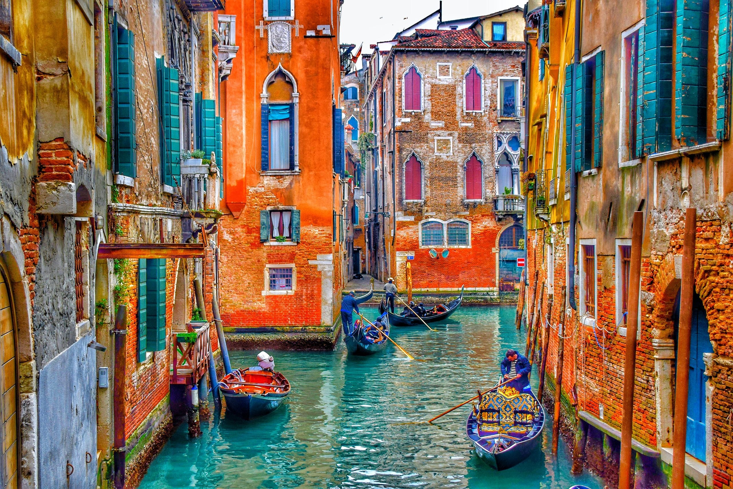 Venice canals (Photo by Tom Podmore on Unsplash)