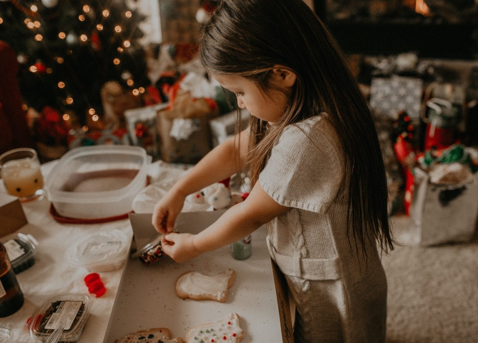 child making Christmas cookies