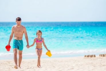 Father and daughter at the beach (Photo: Shutterstock)