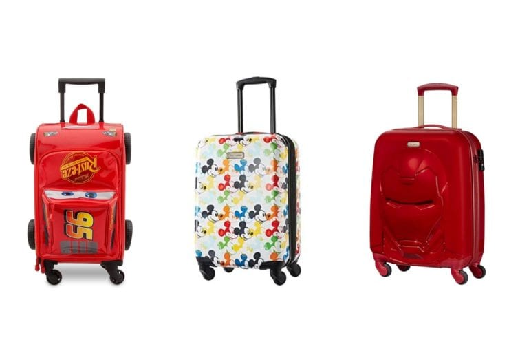 Three Disney luggage pieces: Cars 3 Lightning McQueen carry-on, Mickey Mouse suitcase, and Iron Man hardsided suitcase