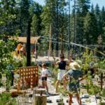 guests playing supersized Connect 4 at Rush Creek Lodge near Yosemite National Park