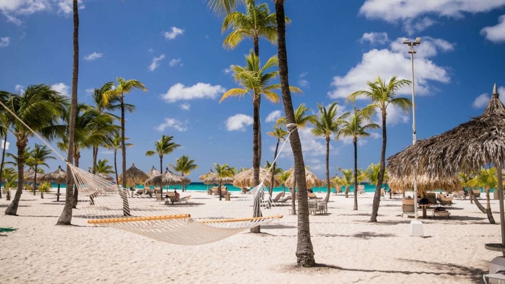 Beach and hammocks at Manchebo Beach Resort and Spa in Aruba (Photo: Manchebo Beach Resort)