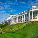 A family walks on the lawn at Grand Hotel on Mackinac Island, Michigan (Photo: Grand Hotel)