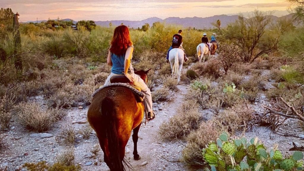 Woman at sunset on horseback in Sonoran Desert, Scottsdale, Arizona (Photo: @jjamhardin via Twenty20)