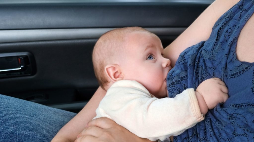 Breastfeeding while traveling in a car (Photo: Shutterstock)
