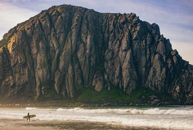 Surfer in Morro Bay, California, near Pismo Beach
