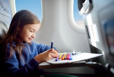 Flying with kids can be a challenge for parents (Photo: MNStudio/Shutterstock)
