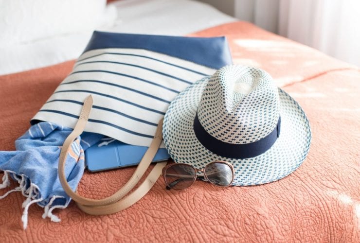 Beach bag and other summer essentials (Photo: Anna Hoychuk / Shutterstock)