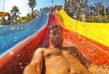 Man on water slide (Photo: @Globetrotter via Twenty20)