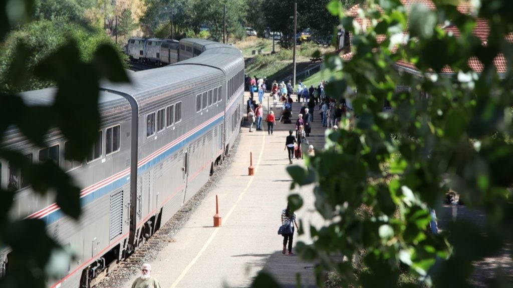 Passengers on train vacations boarding the California Zephyr (Photo: Amtrak)