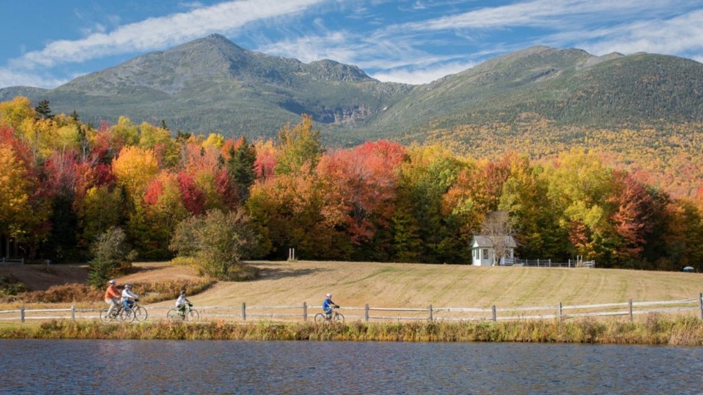 Bicyclers enjoying the New England fall foliage in Gorham, New Hampshire (Photo: Dan Houde / Wiseguy Creative)