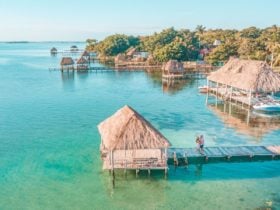 Aerial view of a couple in Bacalar pier, Riviera Maya, Mexico (Photo: Shutterstock)