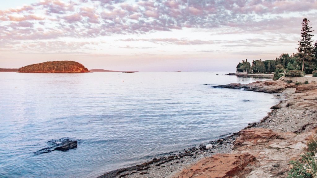 Sunset with water and coast in Acadia National Park