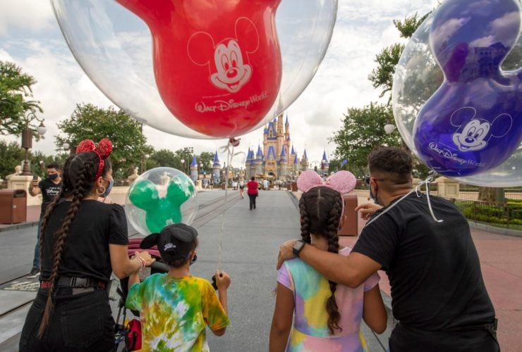 Guests walk down Main Street, U.S.A. at Magic Kingdom Park, July 11, 2020, at Walt Disney World Resort in Lake Buena Vista, Fla., on the first day of the theme park’s phased reopening. What to pack for Disney World