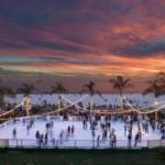Skating by the Sea outdoor ice rink in San Diego in the evening