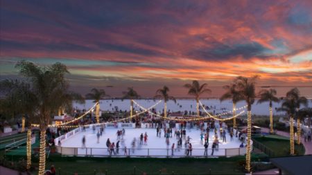 Skating by the Sea outdoor ice rink in San Diego in the evening
