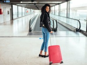 Airport traveler with suitcase (Photo: Shutterstock)