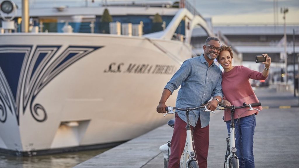 Active seniors taking a selfie on a Uniworld port excursion (Photo: Uniworld)