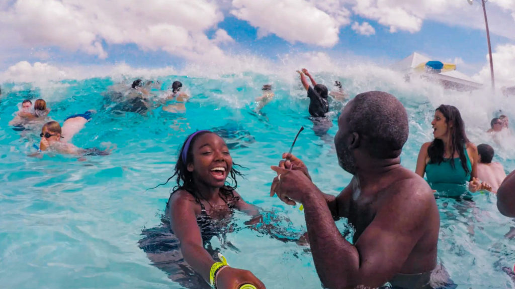 Daughter and father playing in the wave pool at Mt Olympus water park in Wisconsin Dells