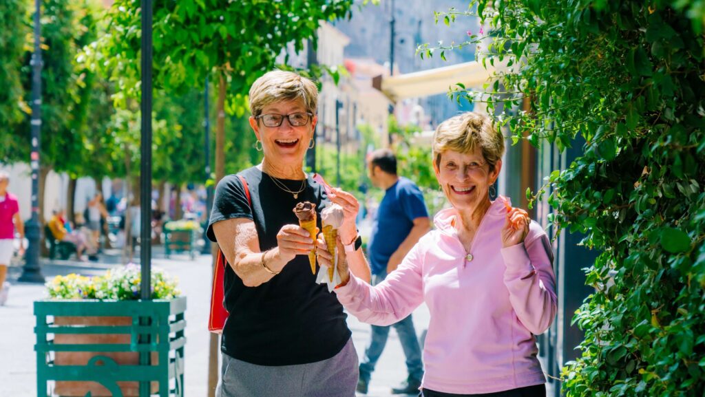 Two women enjoying gelato on a Road Scholar tour in Sorrento