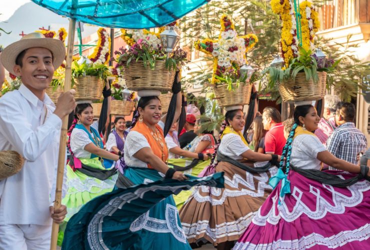 People dressed in traditional clothes for a celebration in Oaxaca, Mexico