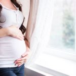 Pregnant woman in comfortable maternity pants (Photo: @DashaPetrenko via Twenty20)