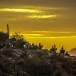 Sunset horseback ride through desert around Tanque Verde, an Arizona dude ranch