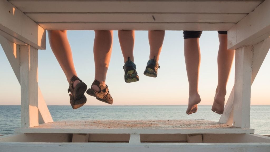 Family dangling feet in Cape Cod, Massachusetts (Photo: Shutterstock)