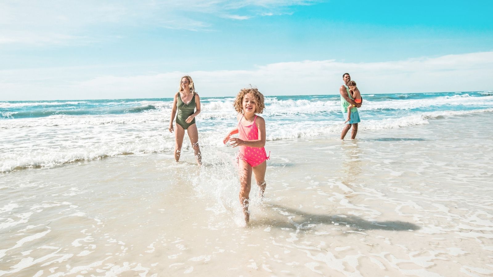 Family playing in the water at Clearwater Beach (Photo: Visit Florida)