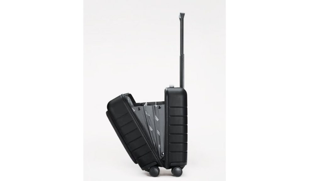 Away's Daily Carry-on suitcase underseat luggage in black, zipped open