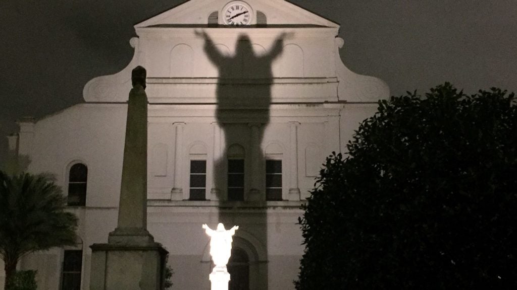 spooky shadow of a statue in New Orleans