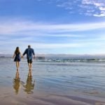 Couple on the beach in San Luis Obispo (Photo: @yellofishdesign via Twenty20)