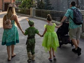 Family walking through Fantasyland near Cinderella's Castle in Magic Kingdom (Photo: Disney)