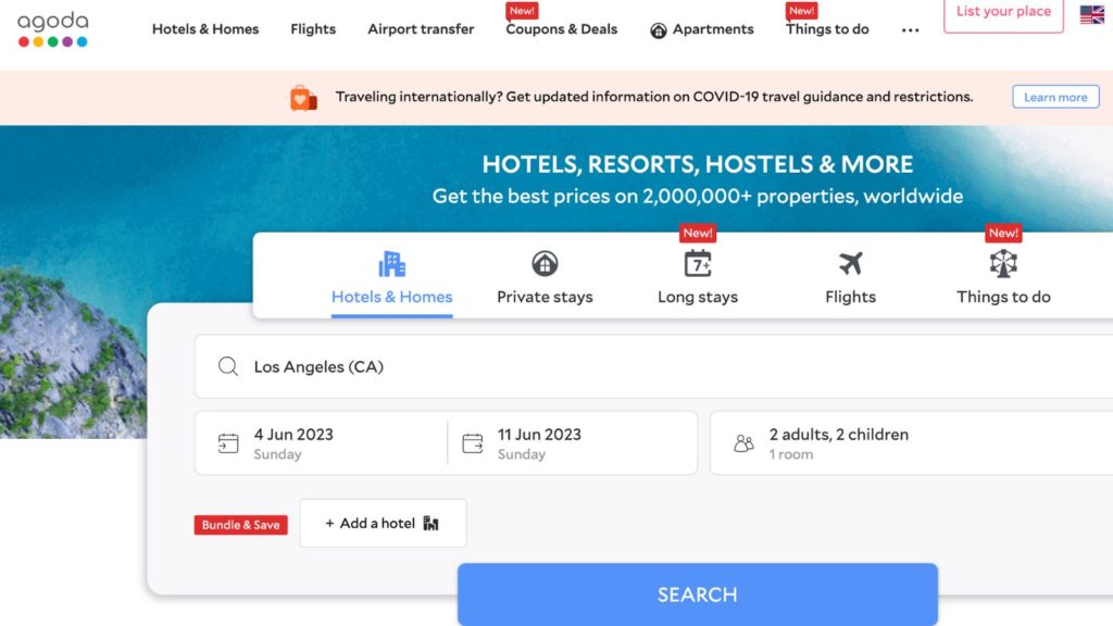 Agoda hotel booking site homepage with hotel search box