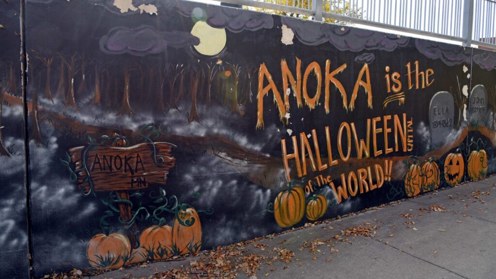 A mural about Halloween with pumpkins and gravestones in Anoka, MA