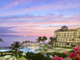 view of the Marriott Puerto Vallarta Resort & Spa at sunset, looking out toward Banderas Bay