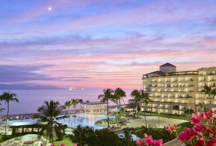 view of the Marriott Puerto Vallarta Resort & Spa at sunset, looking out toward Banderas Bay