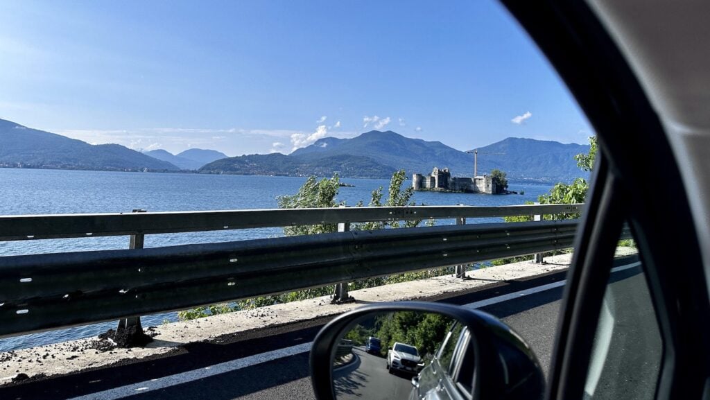 view out car rental window of Lake Maggiore