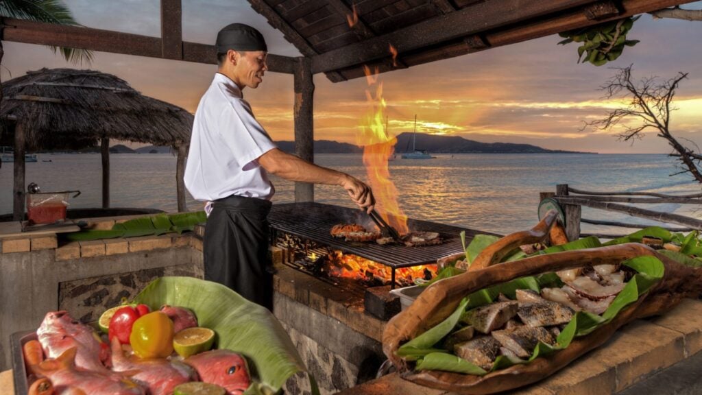 open-fire cooking and fresh seafood at the all-inclusive resort Petit St Vincent