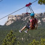 Person on the zipline at Rushmore Tramway Adventures