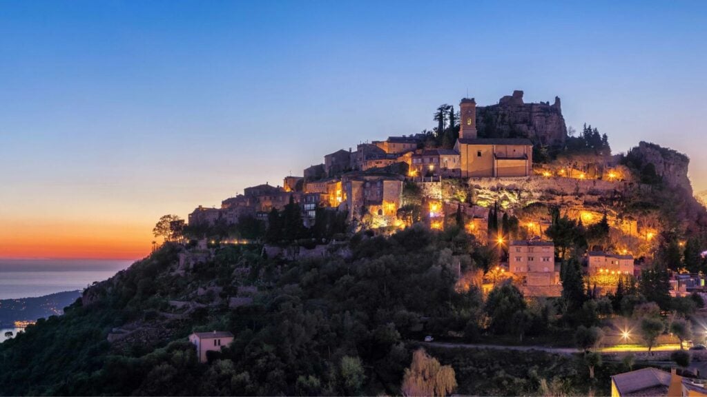 Evening view of the hilltop village of Eze in France with sea in background