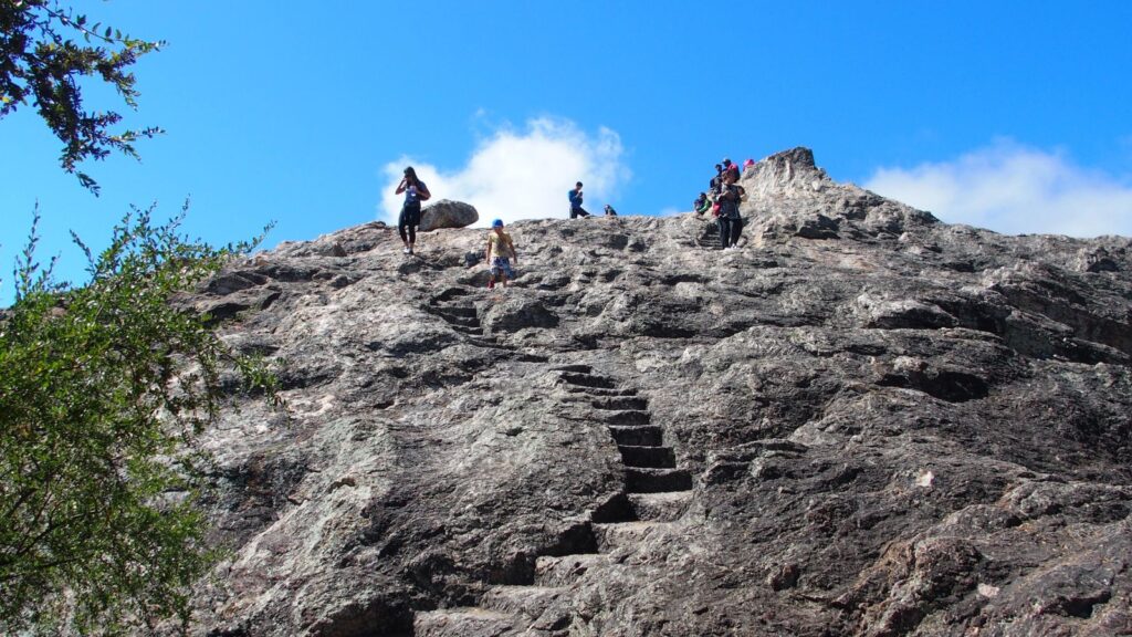 person walking down stone staircase at Indian Rock Park in Berkeley