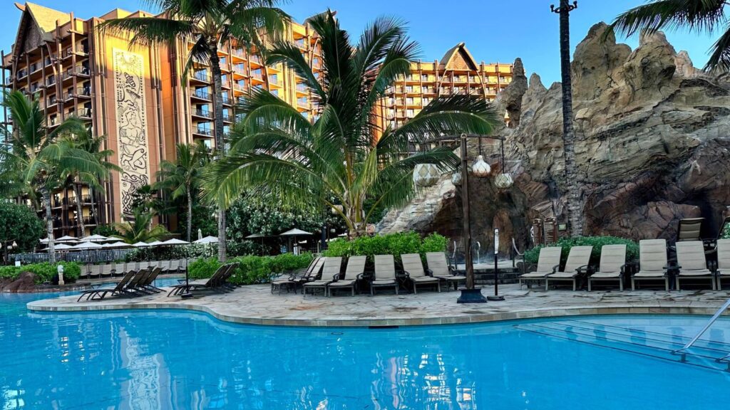 image of pool and pool chairs at Aulani