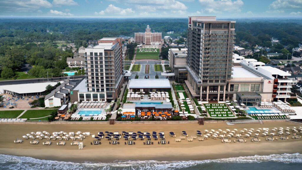 An aerial view of the three lodging options at the Cavalier Resort and the beach
