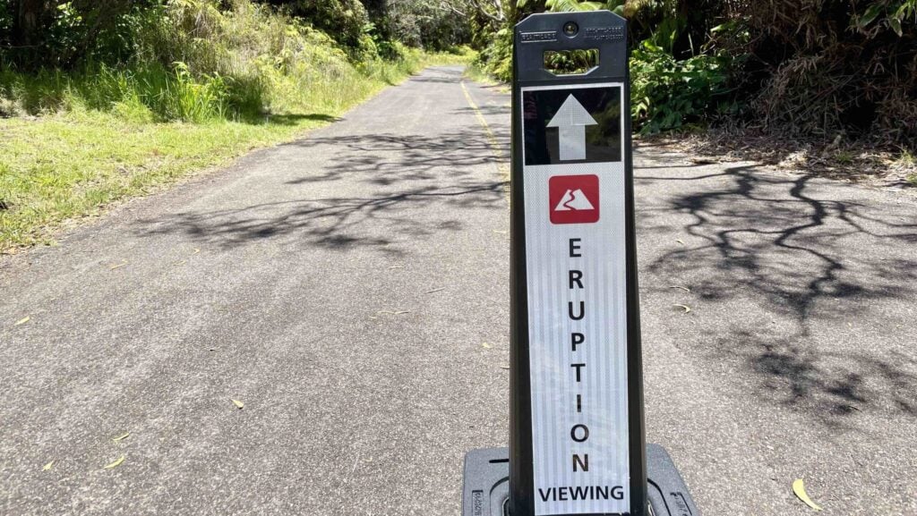 sign that reads "Eruption Viewing" with an arrow at Hawaii Volcanoes National Park on the Island of Hawai'i