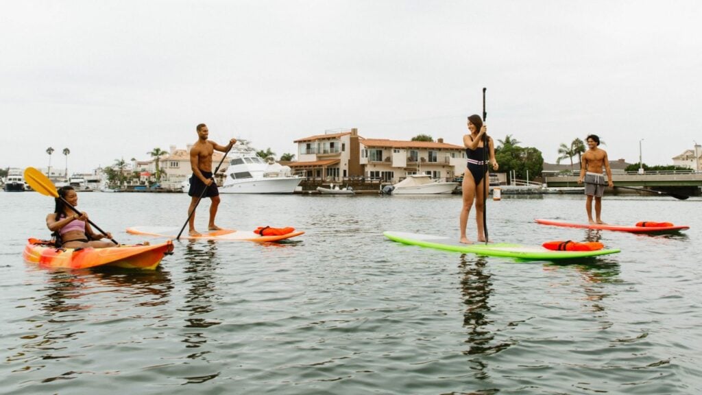 Learn to paddle at peaceful Huntington Harbour (Photo: Visit Huntington Beach)