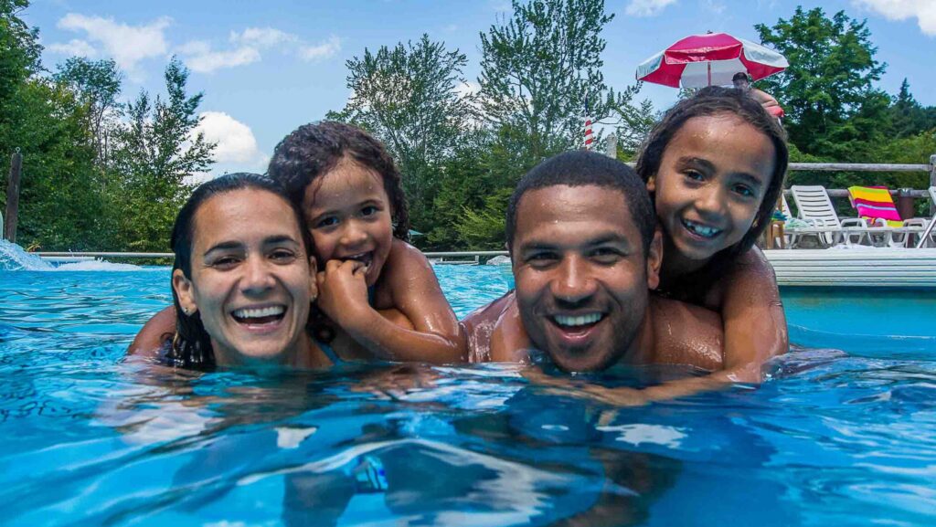 A family in one of the pools at Smugglers' Notch