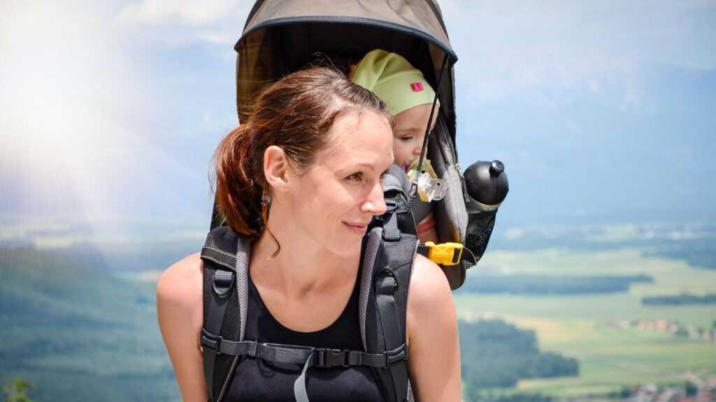 Woman hiking with a baby (Photo: Shutterstock)