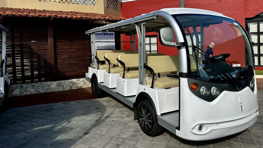 open and closed vehicles transport guests around the resort