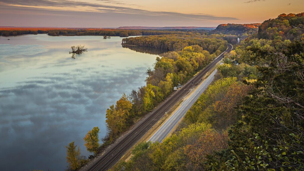 An aerial view of Great River Road in Illinois during the fall